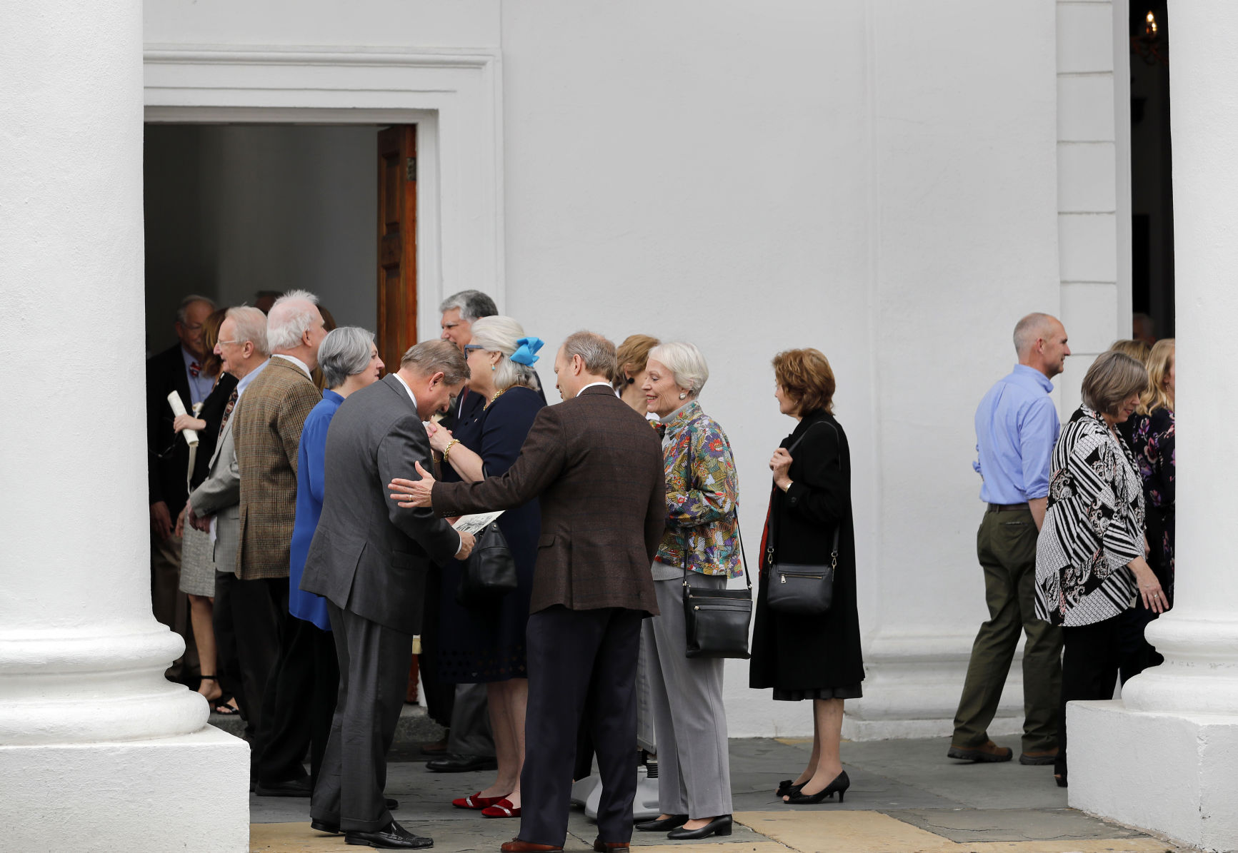 Parishioners leave chruch.jpg